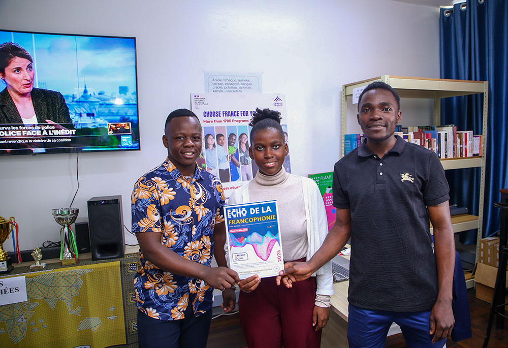 The Technical University of Kenya French Club President Obren Lourmex(left) with two of the club members. The club has launched the first ever French magazine by a Kenyan university called ‘Écho de la Francophonie’.