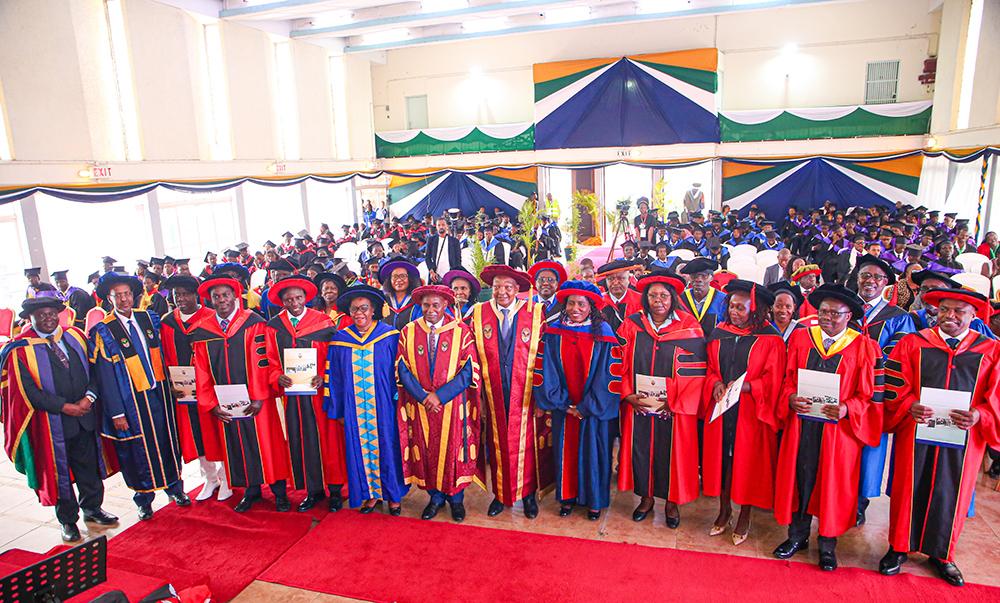 PS Dr. Beatrice Inyangala, the Chancellor,  Chairman of Council, VC and other dignitaries join PhD graduands for a group photo