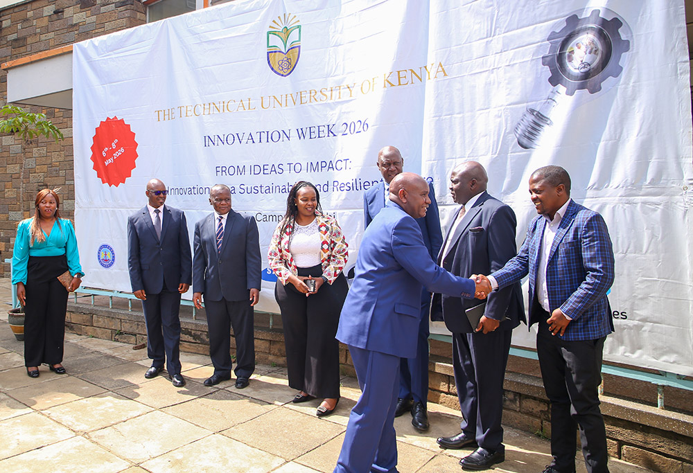 The VC, Prof Benedict Mutua greets a guest ... y of the inaugural TU-K Innovation Week